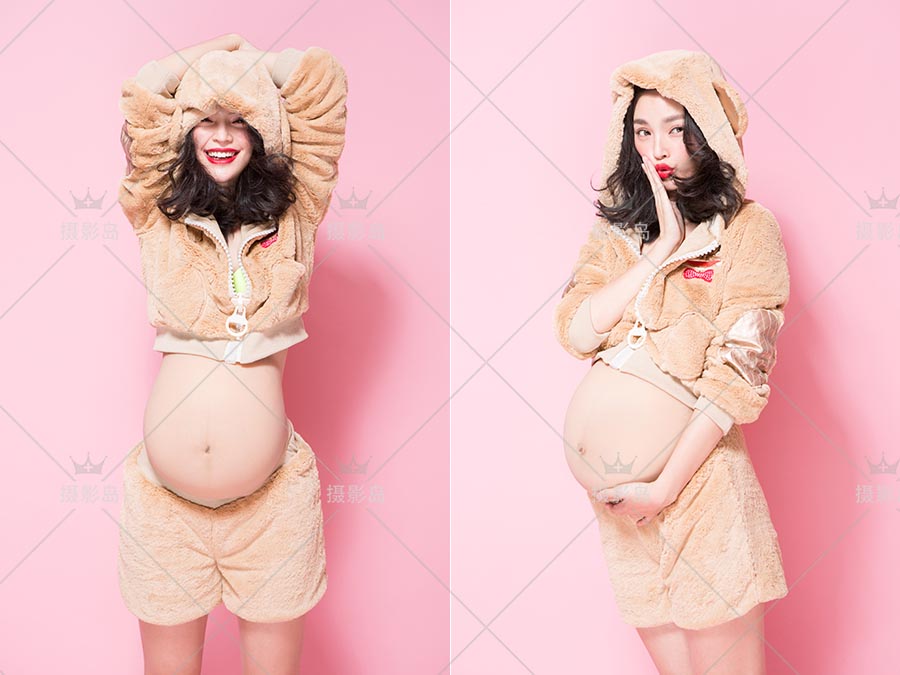 孕妇摄影写真样片，时尚室内粉色纯色背景照片素材
